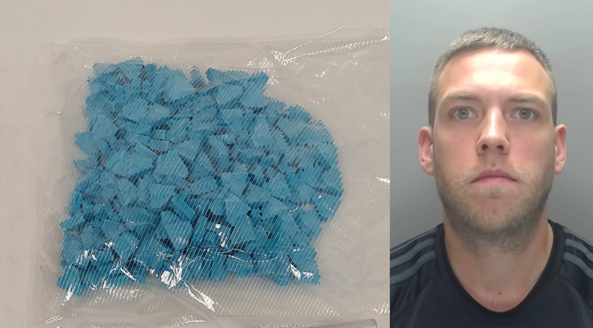 Mugshot of Smith and blue tablets 