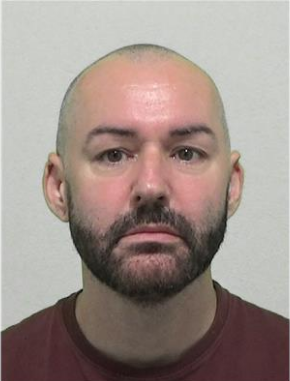 Darren Jarrett custody photo, white bald man 