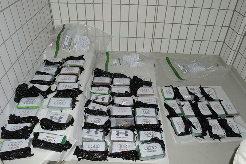 Seized blocks of drugs with Audi and Under Armour logos on