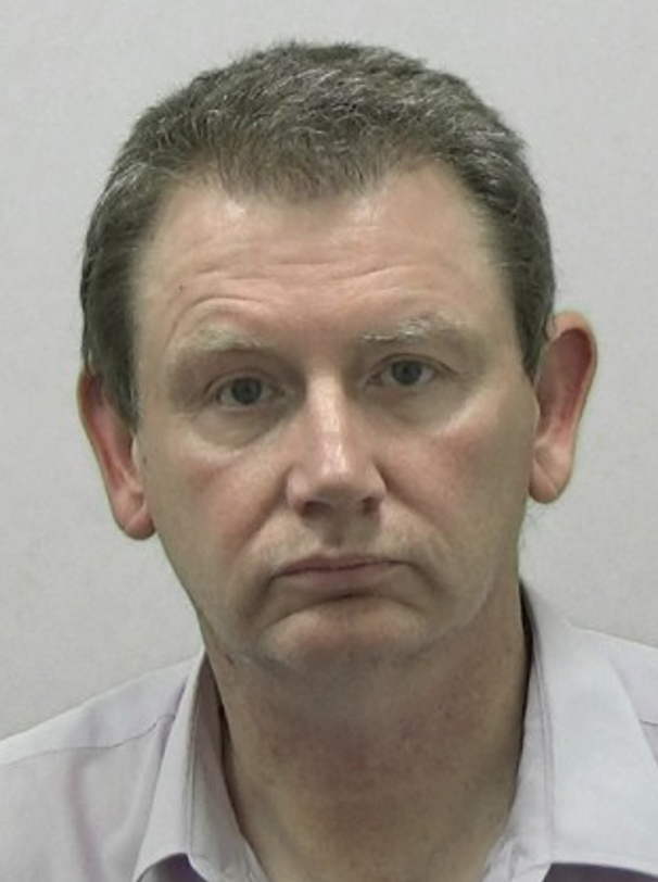 Photo of Brian Smith, a white man with dark hair